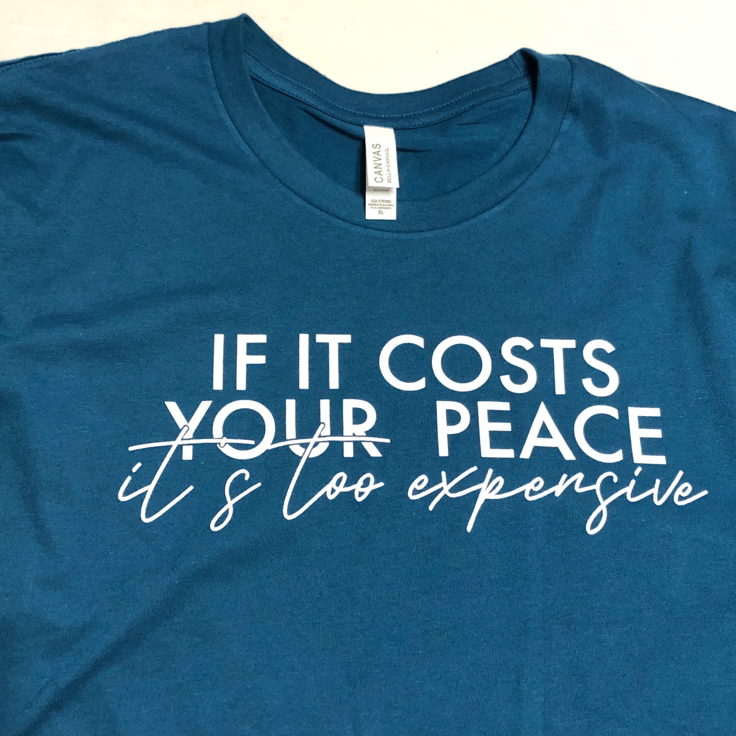 “If It Costs Your Peace, It’s Too Expensive” Blue Shirt