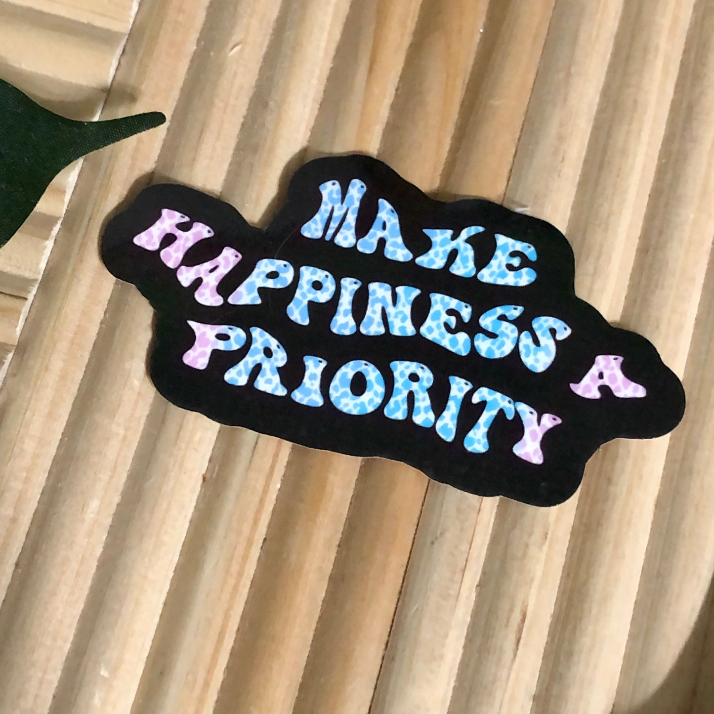 Make Happiness A Priority Black Vinyl Sticker.