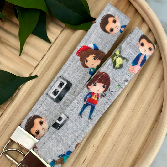 Stranger Things Cartoon Cast Print Fabric Wristlet Keychain, Key Fob